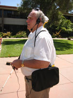 Guidance System with Haptic Pointer Interface.  This
shows the other half of the equipment, including the portable computer,
Haptic Pointer Interface, stereo headphones and head-mounted electronic
compass and microphone for speech interface.
